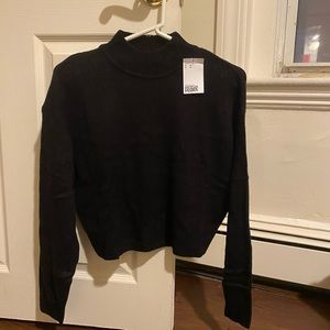 Black crew neck sweater